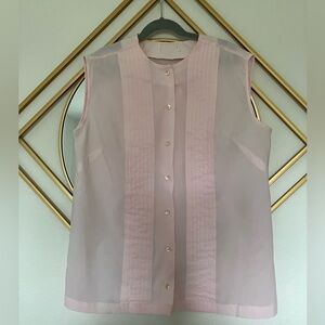 Vintage sleeveless shear button down blouse.